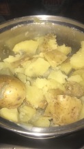 Boiled potatoes with lots of olive oil